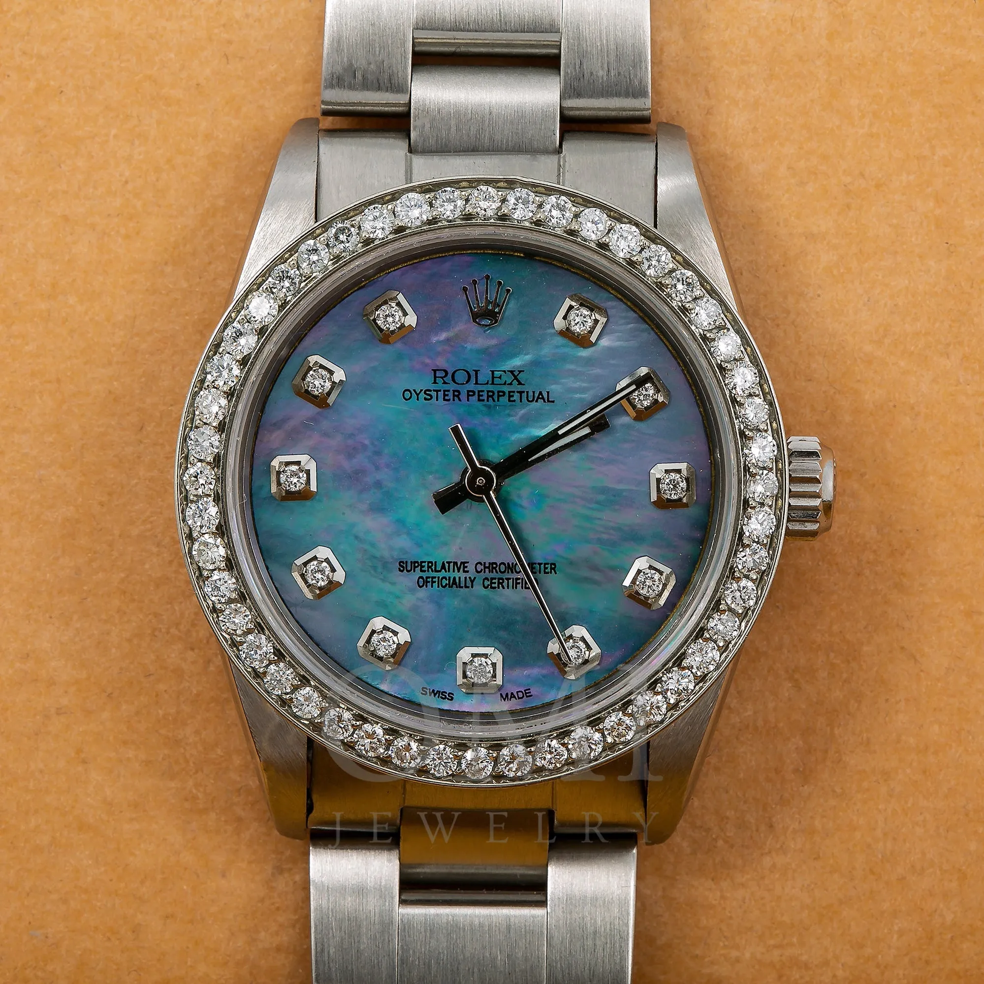 Rolex Oyster Perpetual 67513 31MM Blue Mother of Pearl Diamond Dial With 1.05 CT Diamonds